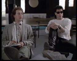 Arye Gross & John Travolta in The Experts