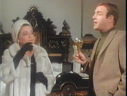 Simone Signoret and James Caan in Games
